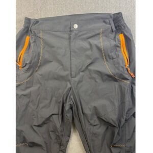 Men's XL Outdoor Sports Cargo Pants Black Orange Hiking has a small burn pants